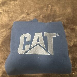 Dark navy blue CAT embroidered logo hoodie. Size medium